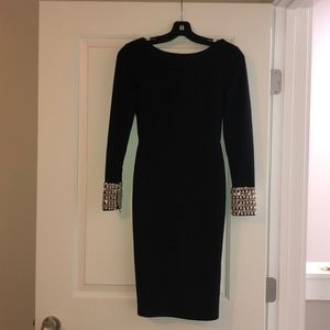 Black dress with rhinestone and pearl sleeves